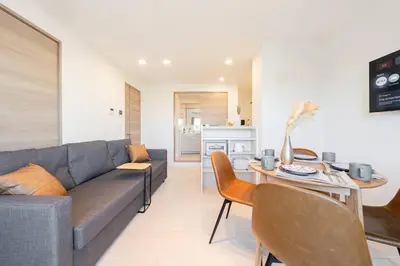 a living room with a couch and a table at House hotel EKODA 301 HE31 in Tokyo