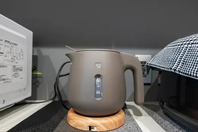 a mixer sitting on a counter next to a microwave at Newly Built 3-Story House in the Heart of Tokyo-Easy Access to Airports,Skytree in Tokyo