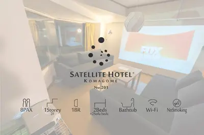 a room with descriptions of a hotel on the wall at SATELLITE HOTEL Komagome \u30b5\u30c6\u30e9\u30a4\u30c8\u30db\u30c6\u30eb\u99d2\u8fbc in Tokyo