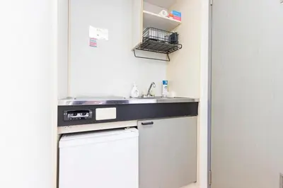 a small kitchen with a sink and a dishwasher at FRt\u6075\u6bd4\u5bff2\u4e01\u76ee305 in Tokyo