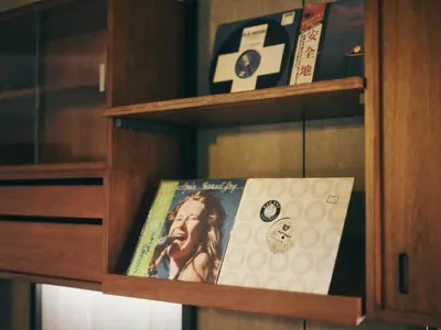 a book is on a book shelf at illi Amu Shimokitazawa in Tokyo