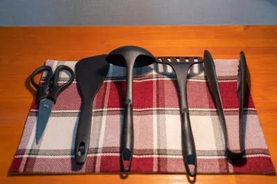 a group of utensils sitting on top of a table at Y's INN 北砂 101T in Tokyo