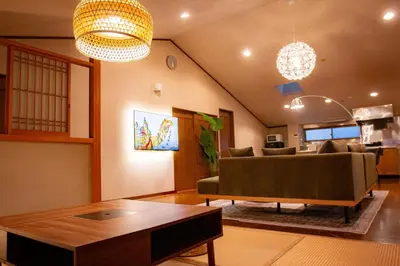 a living room with a couch and a table at Sky Tree View Asakusa in Tokyo