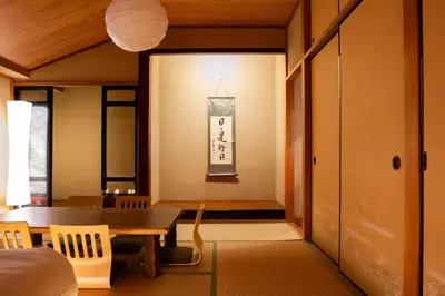 a dining room with a table and a chair at Sky Tree View Asakusa in Tokyo