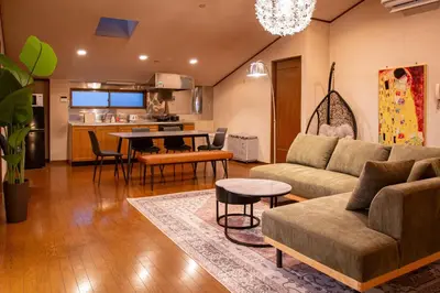 a living room with a couch and a table at Sky Tree View Asakusa in Tokyo