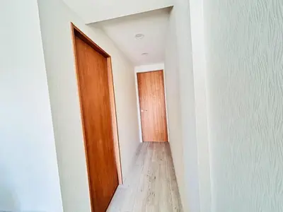 an empty hallway with a door and a wooden floor at Y-Shinjuku City, Okubo 5F-SJ0070 in Tokyo