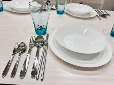 a table with white plates and forks and spoons at Y-Shinjuku City, Okubo 5F-SJ0070 in Tokyo