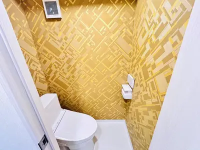 a bathroom with a toilet and a yellow wall at Y-Shinjuku City, Okubo 5F-SJ0070 in Tokyo