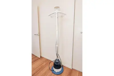 a vacuum cleaner sitting in a corner of a room at kamiikebukuro house 4LDK free wifi free parking in Tokyo