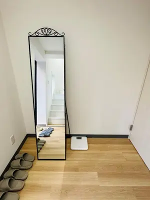 a mirror on the floor in front of a hallway at Sugamo hotel 101-TS0333 in Tokyo