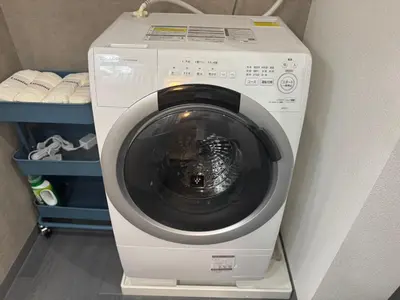 a washer and dryer sitting in a room at Sugamo hotel 101-TS0333 in Tokyo