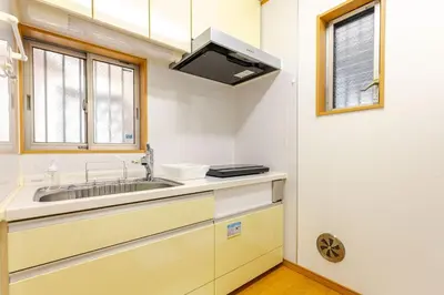 a kitchen with a sink and a window at akl\u6771\u745e\u6c5f3\u4e01\u76ee in Tokyo