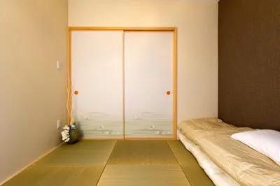 a bedroom with a large glass door with a bed at N102 NEW OPEN IKEBUKURO FREE WiFi MAX7GUESTS in Tokyo