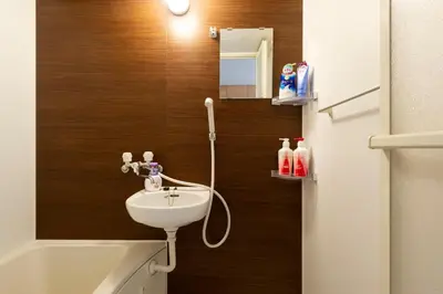 a small bathroom with a sink and a toilet at N102 NEW OPEN IKEBUKURO FREE WiFi MAX7GUESTS in Tokyo