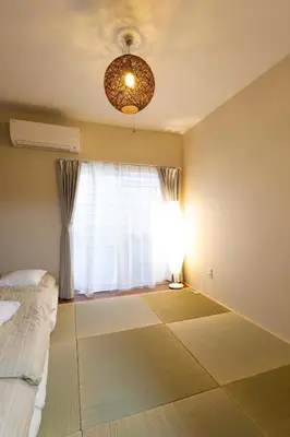 a bedroom with a bed and a window at N102 NEW OPEN IKEBUKURO FREE WiFi MAX7GUESTS in Tokyo