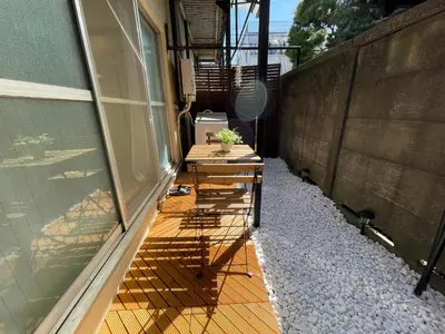 a patio with a table with a potted plant on it at Best Shinjuku Modern Full-furnished Family size Apartment5 ONLY 2min to Shinjuku by Train in Tokyo