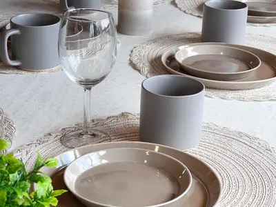 a table with plates and a glass of wine at \u8429\u5c3e\u30d3\u30eb\u56db\u968e\u4e94\u968e in Tokyo
