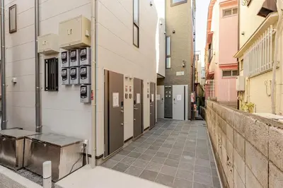 a hallway of a building with lockers on the side at ksf\u4e0a\u6c60\u888b3\u4e01\u76ee101 in Tokyo