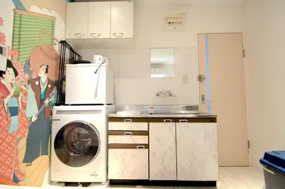 a kitchen with a washing machine and a sink at 10min Meguro Sta 18min Shibuya Sta Max2 SAKURA meguro203 in Tokyo