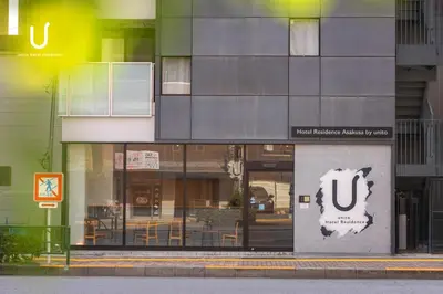 a building with a sign on the front of it at Hotel Residence Asakusa by unito in Tokyo