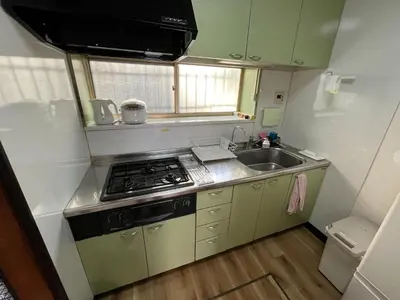 a small kitchen with a stove and a sink at 1\uff0d54\uff0d8 - Vacation STAY 61773v in Tokyo