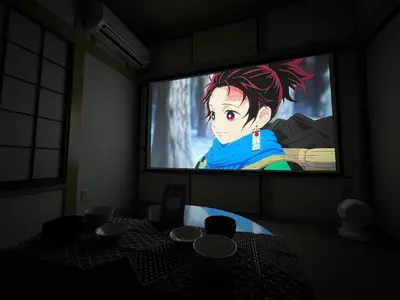 a room with a television with a table with bowls on it at 1\uff0d54\uff0d8 - Vacation STAY 61773v in Tokyo