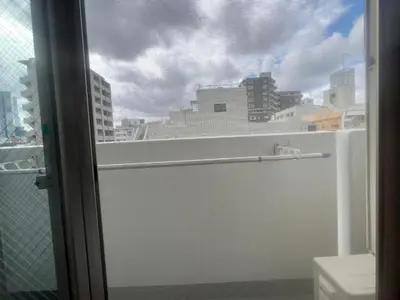 a bathroom with a window with a view of a city at ARSTAY Ikebukuro - Vacation STAY 65934v in Tokyo