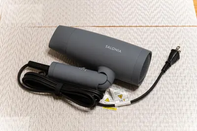 a blow dryer sitting on top of a table at Japanese Art Room, 2Bed Room, 4Bed, Near Metro&JR station in Tokyo