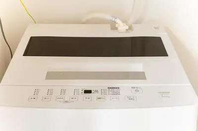 a close up of a washing machine at Japanese Art Room, 2Bed Room, 4Bed, Near Metro&JR station in Tokyo