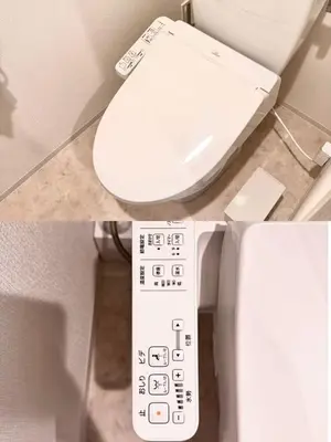 a bathroom with a toilet and a remote control at Asakusa 802 Triple Room in Tokyo