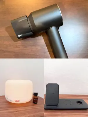 a blow dryer and a phone on a table at Asakusa 802 Triple Room in Tokyo