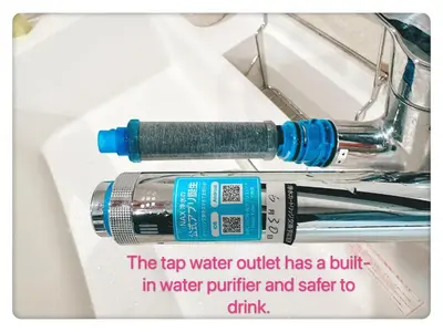 a bottle of water sitting on top of a sink at Hao Bros Home Gemini A in Tokyo