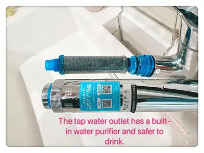 a bottle of water sitting on top of a sink at Hao Bros Home Gemini B in Tokyo