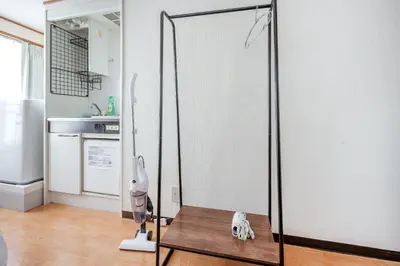 a room with a glass door with a dog toy on a table at T s\u30cf\u30a4\u30e0 in Tokyo