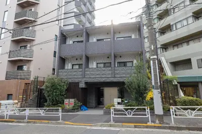 an empty street in front of a building at AlTERNA\u6075\u6bd4\u5bff in Tokyo