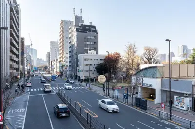 a busy city street with cars on the road at AlTERNA\u6075\u6bd4\u5bff in Tokyo
