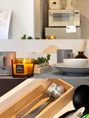 a kitchen counter with a tray with a candle and utensils at Asakusa 701 Quad Room in Tokyo