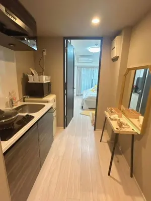 a kitchen with a sink and a counter top at ReimiMondo 303 in Tokyo