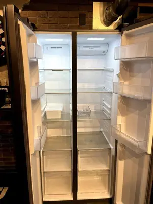 an open refrigerator with its door open and its shelves at ebo\u7d30\u5de5\u753a3\u4e01\u76ee4F in Tokyo