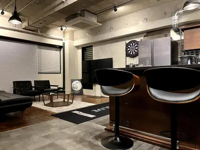 a bar with chairs and a counter in a room at ebo\u7d30\u5de5\u753a3\u4e01\u76ee4F in Tokyo