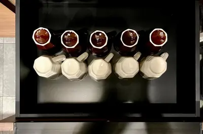 a group of chocolate muffins sitting on a shelf at ebo\u7d30\u5de5\u753a3\u4e01\u76ee4F in Tokyo