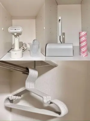 a white shelf with a phone and other items on it at Asakusa 402 Triple Room in Tokyo