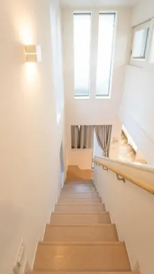 a staircase in a house with two windows at \u6075\u6bd4\u5bff\u99c5\u5f92\u6b695\u5206 \u8cb8\u5207\u4e00\u8ed2\u5bb6 in Tokyo