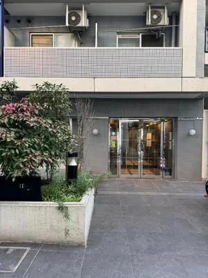 an entrance to a building with a glass door at Ikebukuro 507 Twin Room in Tokyo