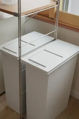 two white shelves in a room with a desk at Ikeda Ueno 301 Twin Room in Tokyo