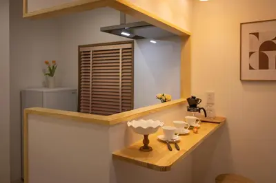 a counter with cups and a mirror in a room at Near Shinjuku,3LDK Mansion,3bedrooms,12 people in Tokyo