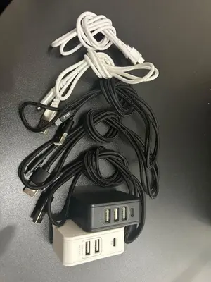 a pile of cables on top of a cell phone at \u65b0\u5bbf2\u7a2e\u985e\u306e\u697d\u3057\u307f\u65b0\u5bbf\u3067\u697d\u3057\u304f\u904e\u3054\u3059\u304a\u5bb6Wi-Fi\u5b8c\u5099\u30c1\u30a7\u30c3\u30af\u30a2\u30a6\u30c812\u6642 in Tokyo