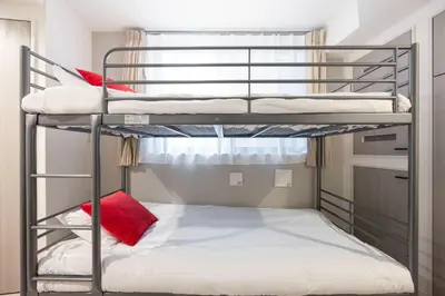 a bunk bed room with two bunk beds at \u30aa\u30fc\u30af\u30ec\u30b9\u30c8\u6075\u6bd4\u5bff in Tokyo