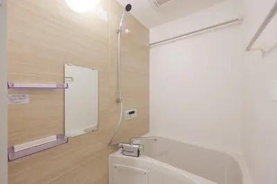 a bathroom with a toilet and a shower at Bel Avenir in Tokyo