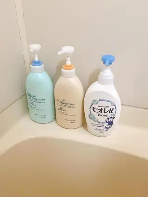 three bottles of cleaning products sitting on a sink at ToyamaHouse2-203 in Tokyo